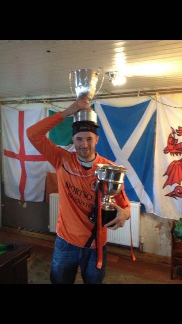 Cup on the head for delighted James